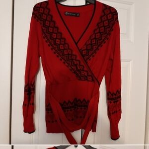 Red and black fair isle sweater.